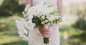 Bride Holding white flower bouquet